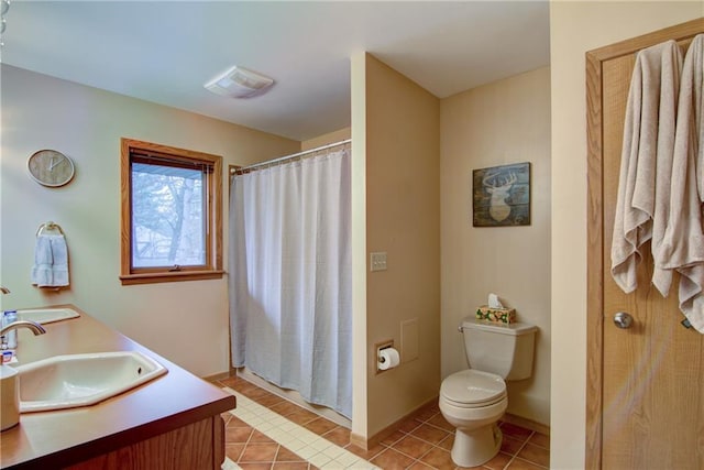 bathroom with tile patterned floors, vanity, curtained shower, and toilet