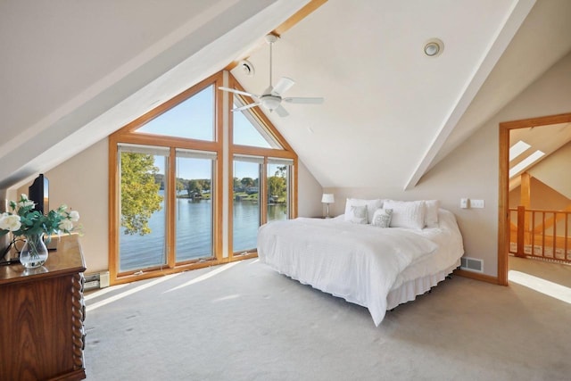 carpeted bedroom with access to outside, ceiling fan, a water view, and lofted ceiling