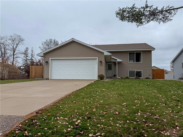 view of front facade with a front lawn and a garage