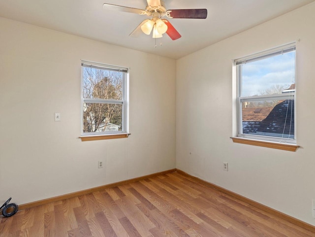 unfurnished room with light hardwood / wood-style floors