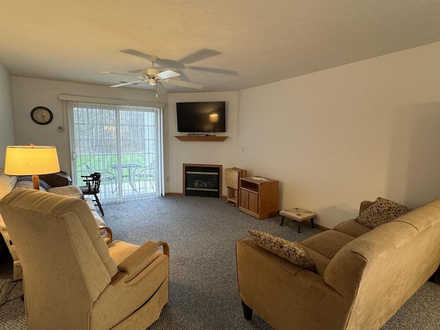 living room with carpet flooring and ceiling fan