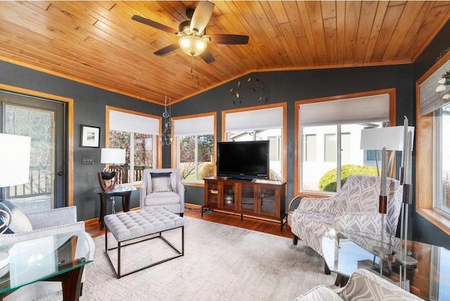 living room featuring hardwood / wood-style floors, ceiling fan, wood ceiling, and vaulted ceiling