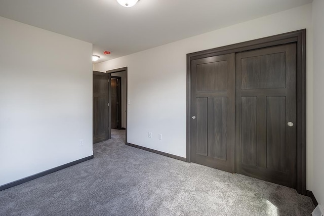 unfurnished bedroom with carpet flooring