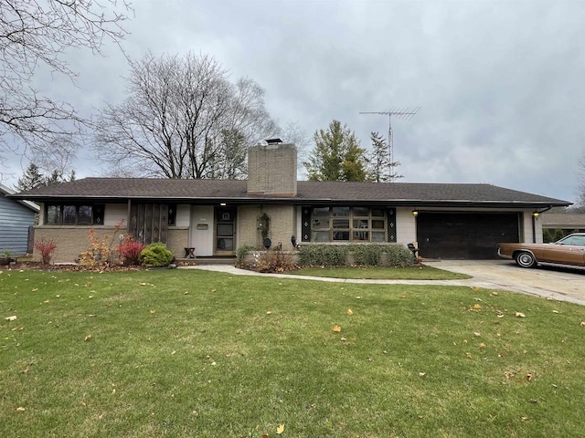 ranch-style home with a garage and a front yard