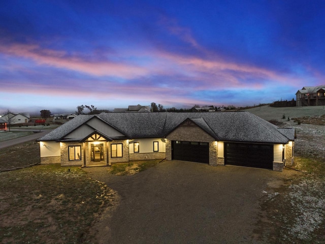 view of front of property with a garage