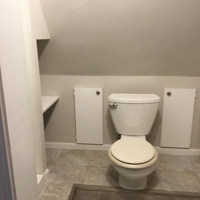 1002 7th Aly, Crivitz, WI 54114 - bathroom featuring toilet and baseboards