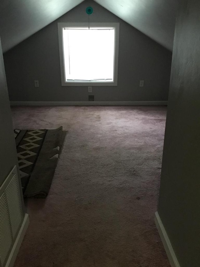 1002 7th Aly, Crivitz, WI 54114 - bonus room with carpet floors, lofted ceiling, and baseboards