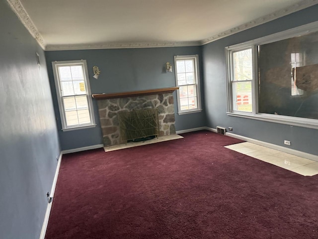 unfurnished living room with a fireplace, carpet floors, and ornamental molding