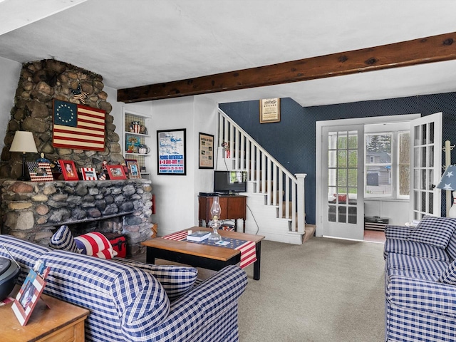 W6540 County Road C, Plymouth, WI 53073 - carpeted living area featuring stairs, beam ceiling, and a fireplace