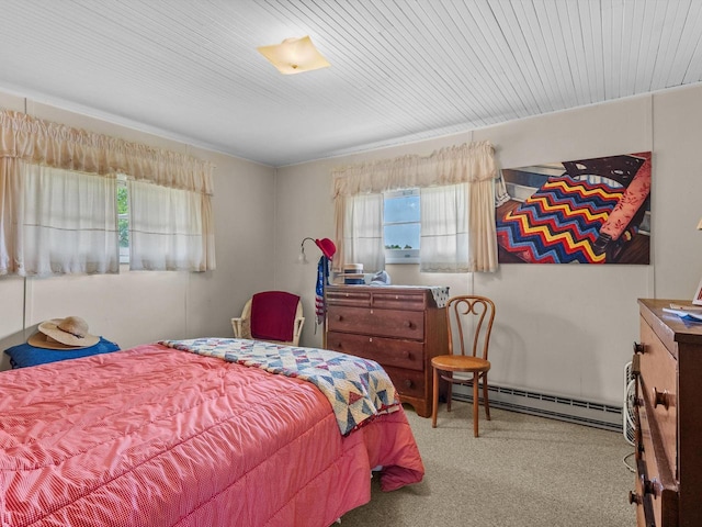 W6540 County Road C, Plymouth, WI 53073 - carpeted bedroom with a baseboard heating unit