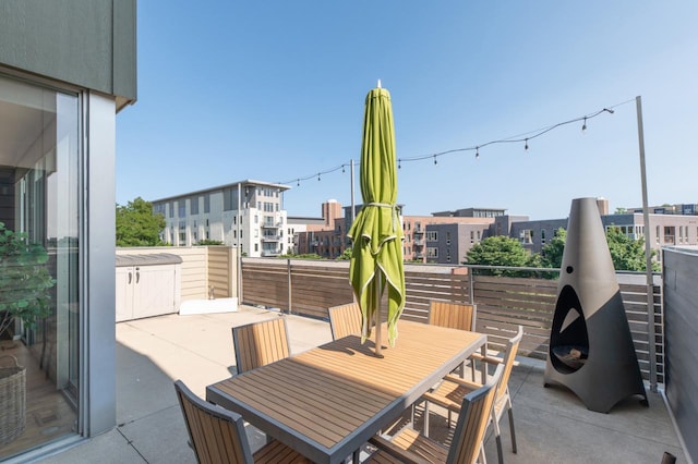 view of patio / terrace with a balcony