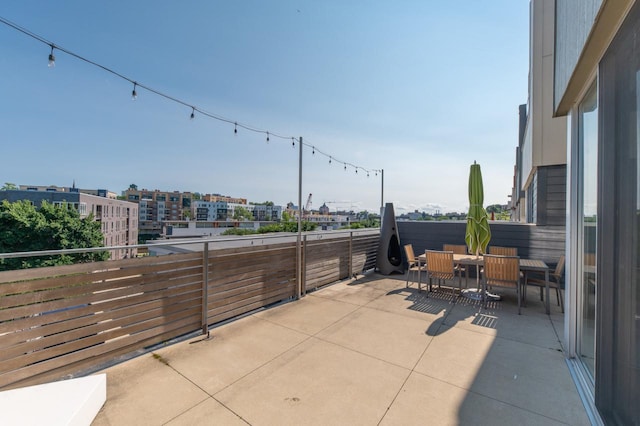 view of patio / terrace featuring a balcony