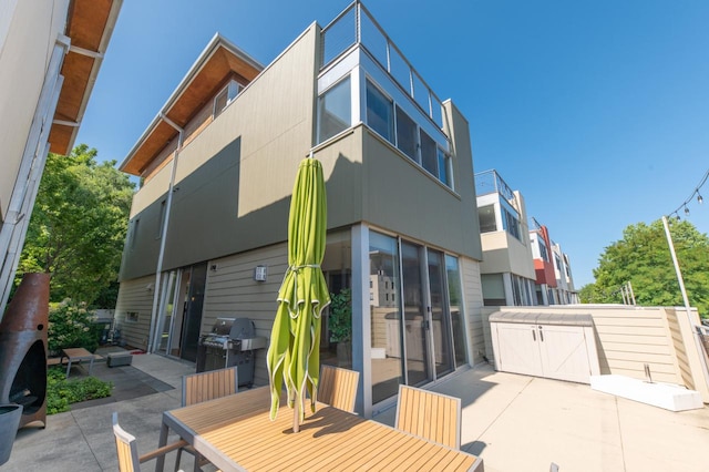 back of house featuring a patio area