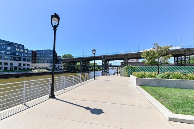 view of community with a water view