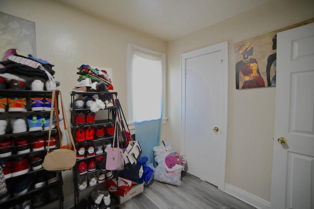 4828 N 25th St, Milwaukee, WI 53209 - recreation room with wood finished floors and baseboards