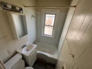 4828 N 25th St, Milwaukee, WI 53209 - bathroom with toilet, a bath, vanity, and a shower
