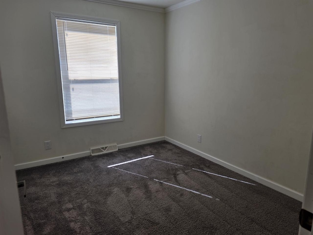 1407 N Peach Ave Unit 119, Marshfield, WI 54449 - empty room featuring dark carpet and crown molding
