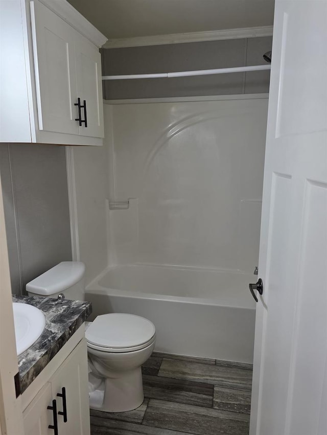 1407 N Peach Ave Unit 119, Marshfield, WI 54449 - full bathroom featuring wood finished floors, vanity, and shower / washtub combination