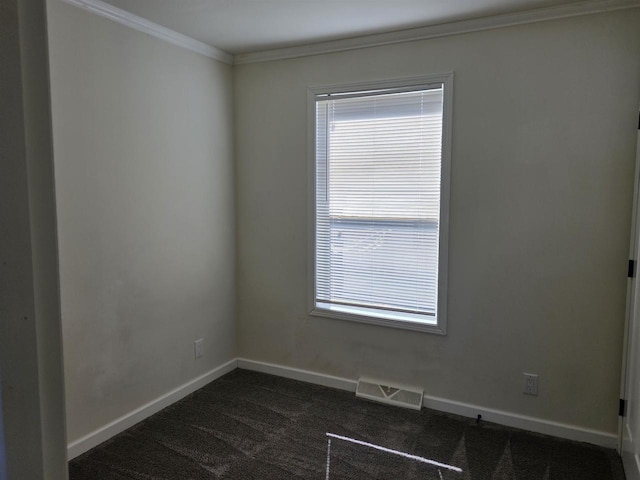 1407 N Peach Ave Unit 119, Marshfield, WI 54449 - unfurnished room with dark carpet and ornamental molding