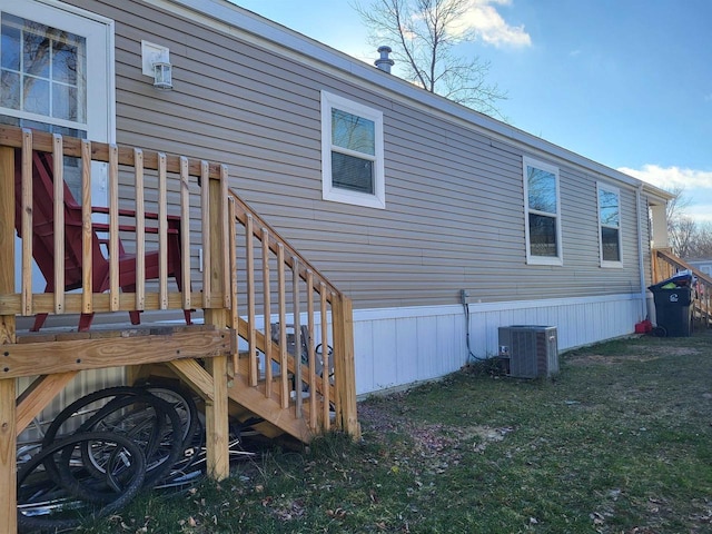 1407 N Peach Ave Unit 119, Marshfield, WI 54449 - view of side of home with stairway and a lawn