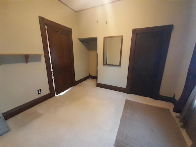 empty room with light colored carpet