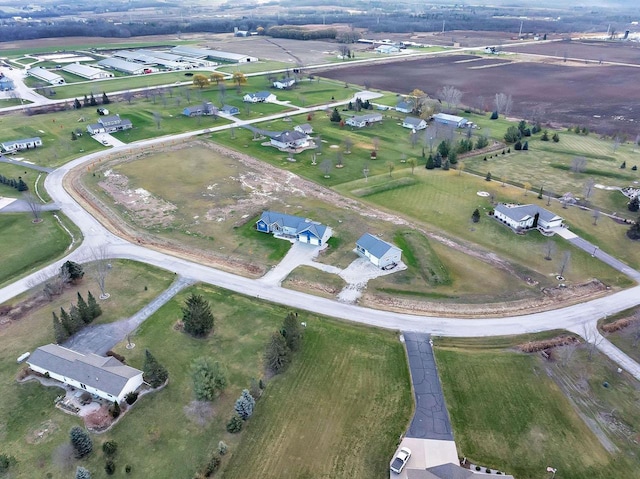 birds eye view of property featuring a rural view