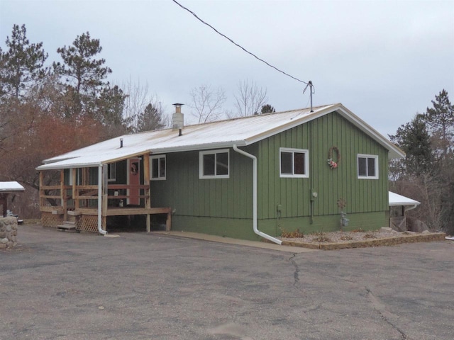 rear view of house with a deck