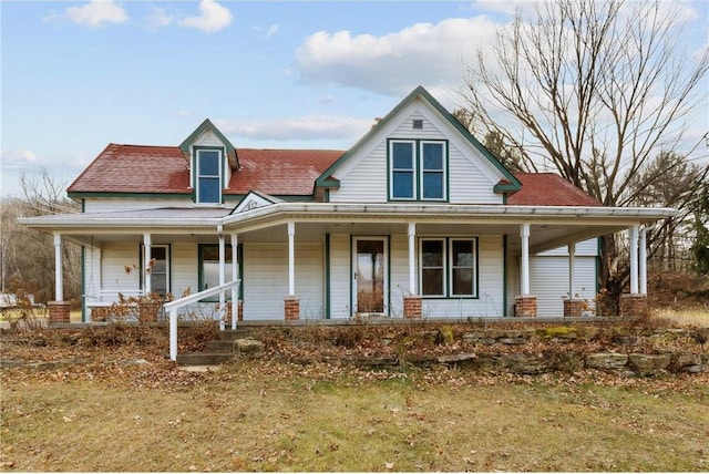 farmhouse-style home with covered porch