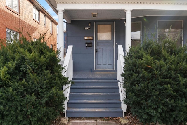 entrance to property with covered porch