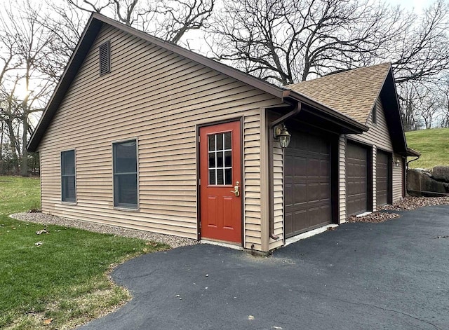 view of home's exterior with a garage