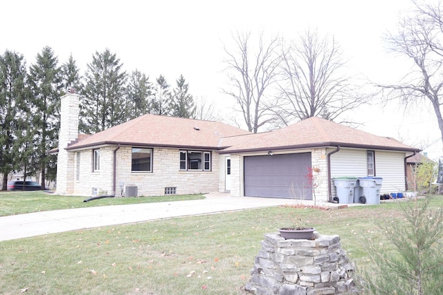 ranch-style house with central AC, a front lawn, and a garage