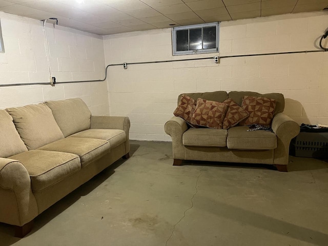 living room featuring concrete flooring