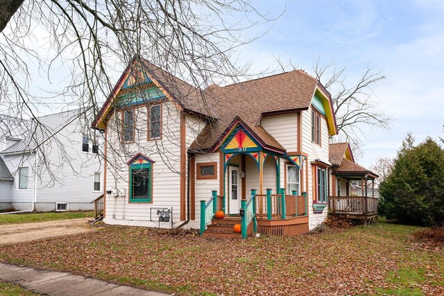 130 W Maple St, Viroqua, WI 54665 - victorian-style house with roof with shingles