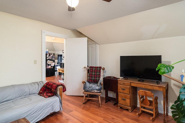 130 W Maple St, Viroqua, WI 54665 - living room with ceiling fan, wood finished floors, and vaulted ceiling