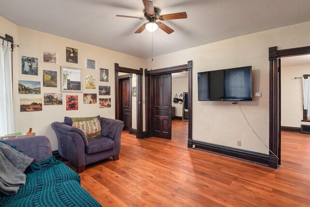 130 W Maple St, Viroqua, WI 54665 - living room featuring ceiling fan and light wood-style floors