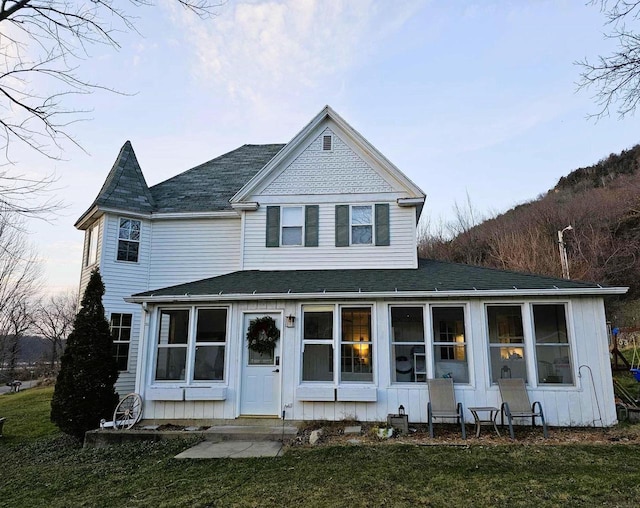 exterior space featuring a sunroom