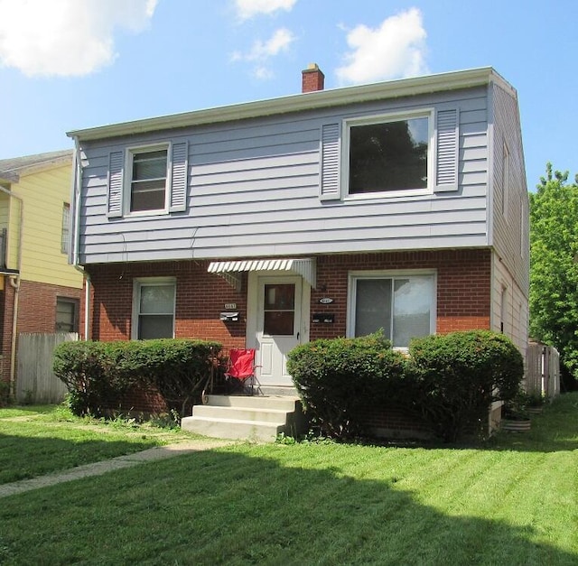 view of front of home with a front yard