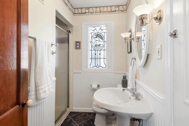 2572 N Shore Dr, Delavan, WI 53115 - full bath featuring wainscoting, a stall shower, toilet, and marble finish floors
