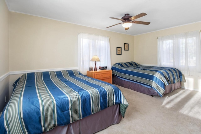 2572 N Shore Dr, Delavan, WI 53115 - bedroom with carpet, crown molding, and ceiling fan