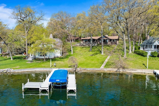 2572 N Shore Dr, Delavan, WI 53115 - dock with a water view, boat lift, and a lawn