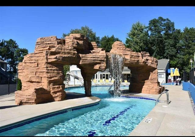 1093 Canyon Rd Unit 406, Wisconsin Dells, WI 53965 - community pool featuring a water slide