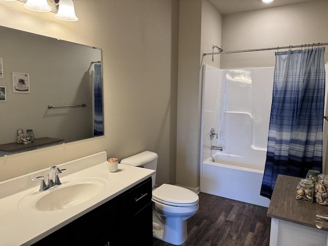 full bathroom with toilet, wood-type flooring, shower / bath combo, and vanity