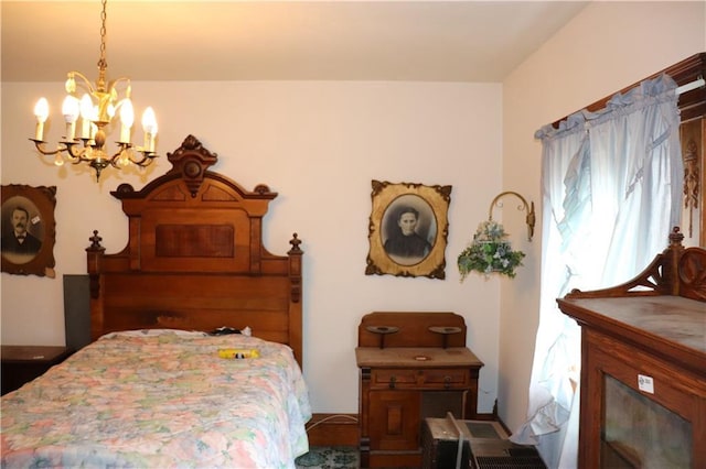 bedroom with an inviting chandelier