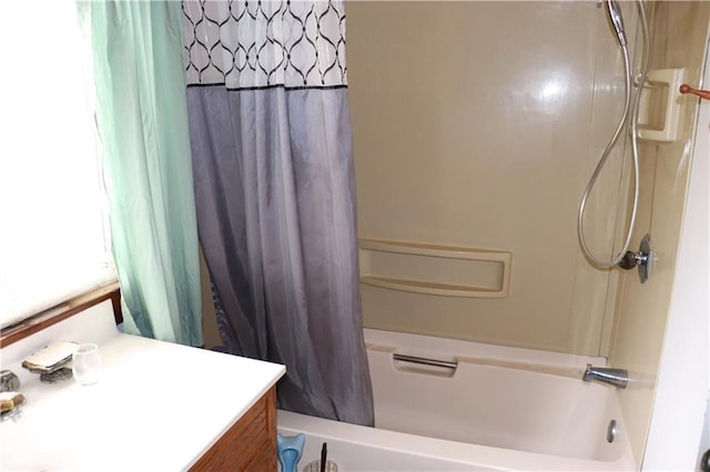 bathroom with shower / bath combination with curtain