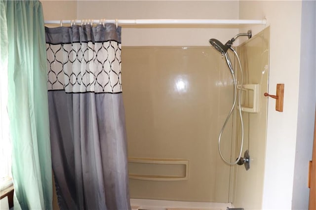 bathroom featuring walk in shower