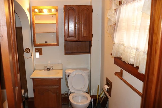 bathroom with vanity and toilet