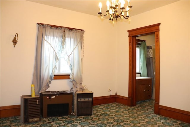 interior space with a chandelier