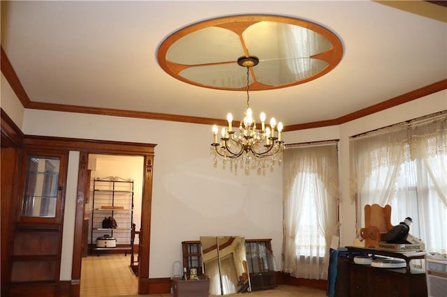 interior space with crown molding and a chandelier