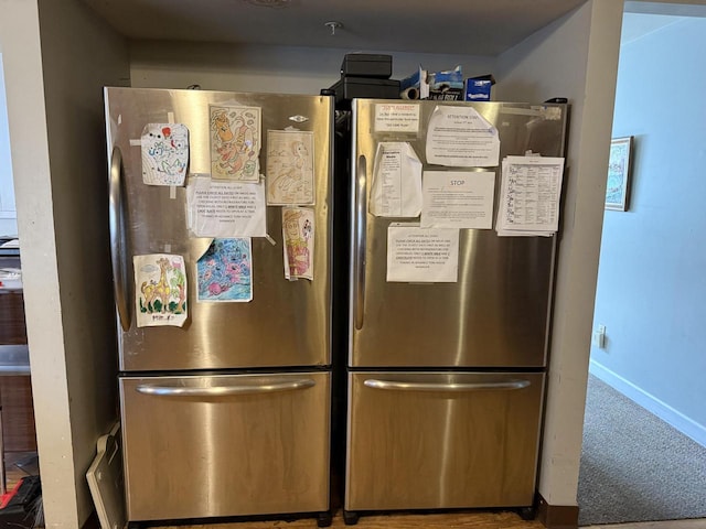 details with stainless steel fridge and carpet