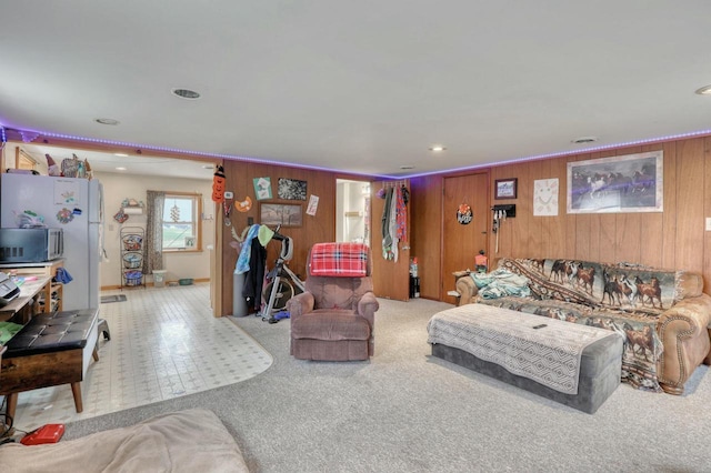 living room featuring wood walls